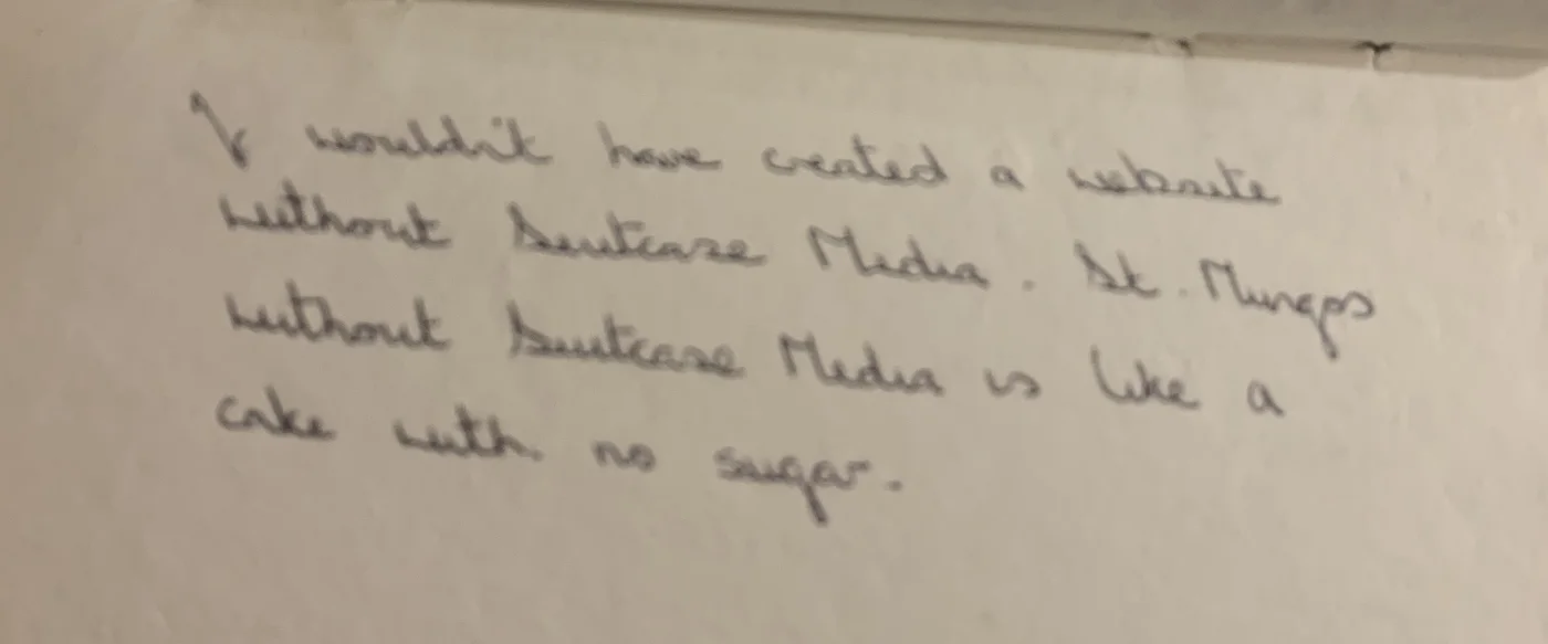 Detail of handwritten participant feedback reading that a website would not have been created without Suitcase Media